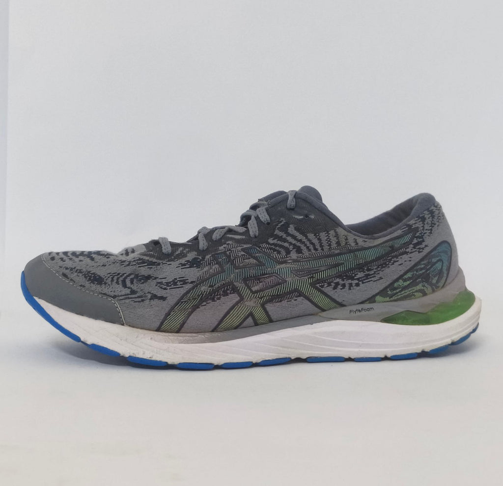 pair of grey ASICS Gel-Kayano running shoes featuring a patterned upper and a blue and white outsole.