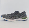 pair of grey ASICS Gel-Kayano running shoes featuring a patterned upper and a blue and white outsole.