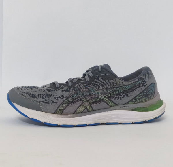 pair of grey ASICS Gel-Kayano running shoes featuring a patterned upper and a blue and white outsole.