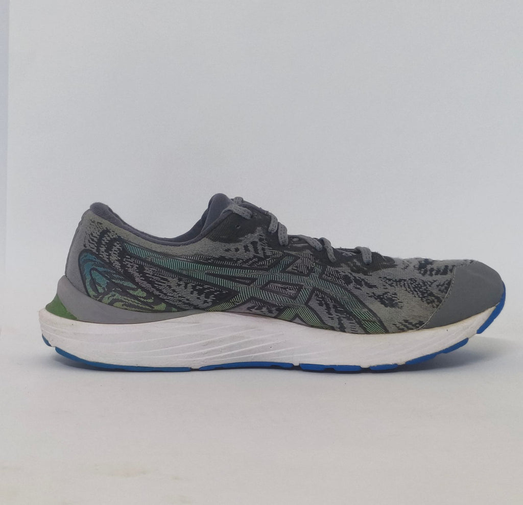 pair of grey ASICS Gel-Kayano running shoes featuring a patterned upper and a blue and white outsole.
