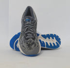 pair of grey ASICS Gel-Kayano running shoes featuring a patterned upper and a blue and white outsole.