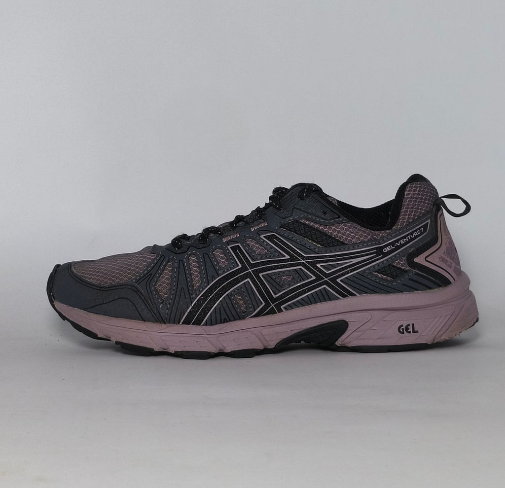 charcoal and lavender Asics GEL-Venture 7 trail running shoe featuring a rugged outsole and signature Asics stripes.