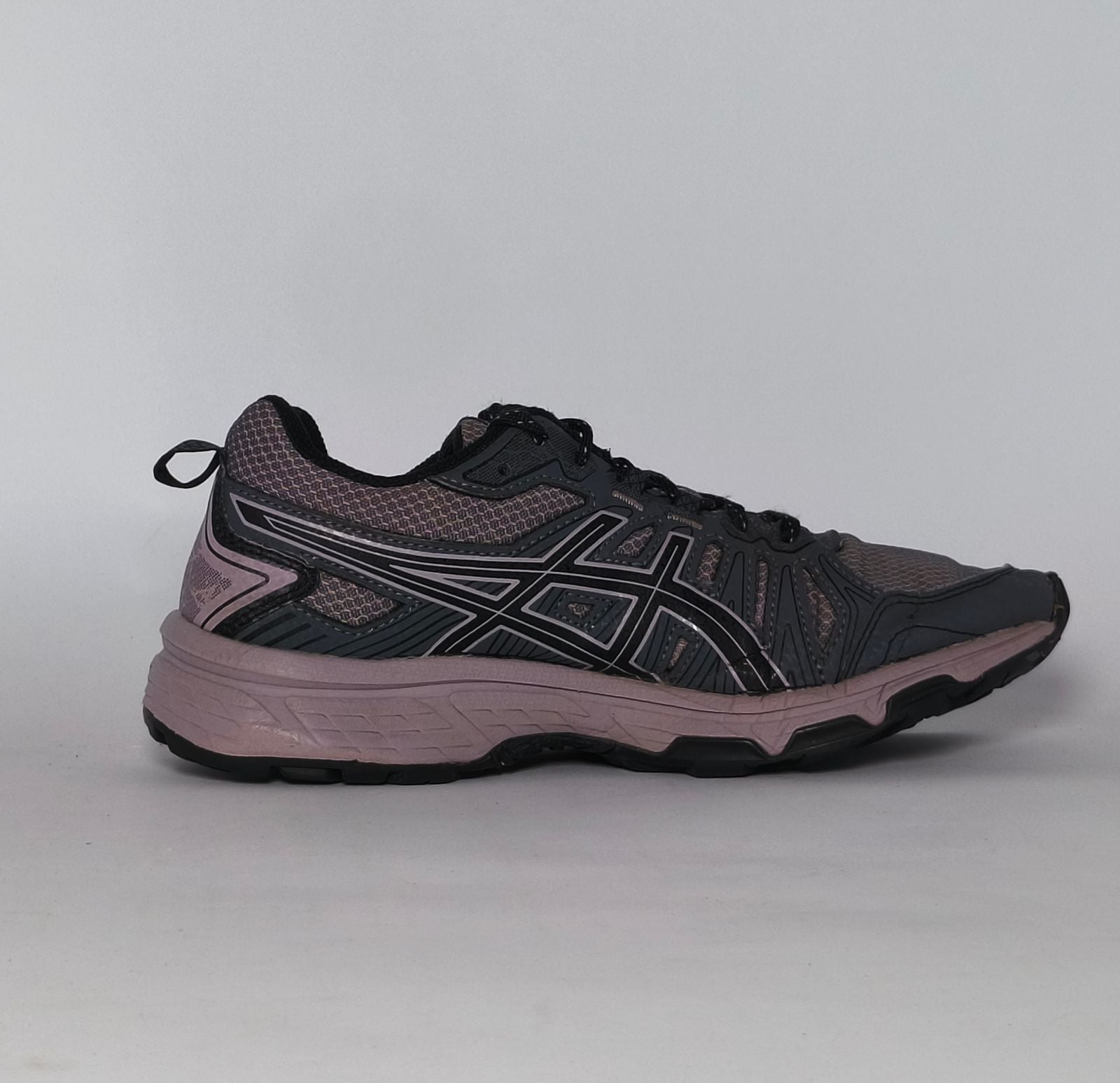 charcoal and lavender Asics GEL-Venture 7 trail running shoe featuring a rugged outsole and signature Asics stripes.