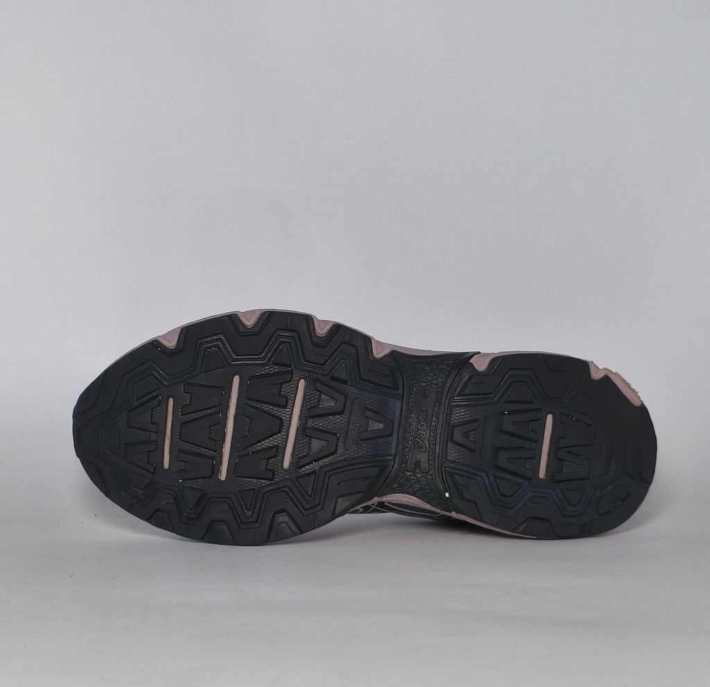 charcoal and lavender Asics GEL-Venture 7 trail running shoe featuring a rugged outsole and signature Asics stripes.
