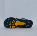 Grey and yellow athletic sneakers with breathable mesh upper and cushioned sole for running and casual wear