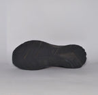 charcoal grey Brooks Revel running shoe featuring a silver logo and a black cushioned midsole.