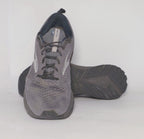 charcoal grey Brooks Revel running shoe featuring a silver logo and a black cushioned midsole.