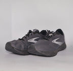 charcoal grey Brooks Revel running shoe featuring a silver logo and a black cushioned midsole.