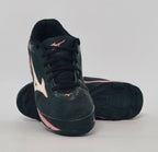 Mizuno Wave Lynx field hockey shoe in black with a pink logo and pink studded turf sole.