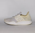 cream and light grey New Balance Fresh Foam Roav running shoe featuring a white textured midsole and a modern Ultra Heel design.