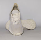 cream and light grey New Balance Fresh Foam Roav running shoe featuring a white textured midsole and a modern Ultra Heel design.