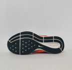 Nike Air Zoom Pegasus 33 running shoe featuring an orange and blue gradient mesh upper and a white Nike Zoom midsole.