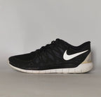 womens-nike-free-5-0-black-white-sneakers-side