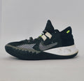 Nike Kyrie Flytrap basketball shoe featuring lime green accents, a white midsole, and a high-traction black outsole.