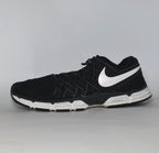 black Nike Lunar Fingertrap TR training shoe featuring a white Swoosh and a white Lunarlon midsole.