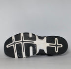 black Nike Lunar Fingertrap TR training shoe featuring a white Swoosh and a white Lunarlon midsole.