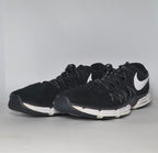 black Nike Lunar Fingertrap TR training shoe featuring a white Swoosh and a white Lunarlon midsole.