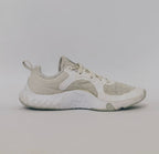 white Nike Renew In-Season TR 10 training shoes featuring a breathable mesh upper and silver Nike Swoosh.