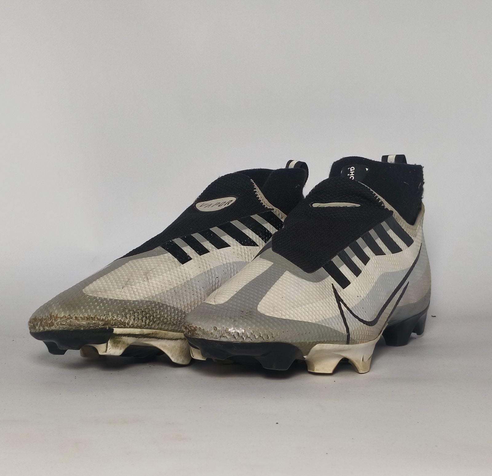 silver and black Nike Mercurial Superfly Academy soccer cleat featuring a Dynamic Fit ankle collar and a specialized multi-ground outsole.