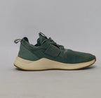 Reebok Nano cross-training shoe featuring a knit upper, cream midsole, and a gum rubber outsole.