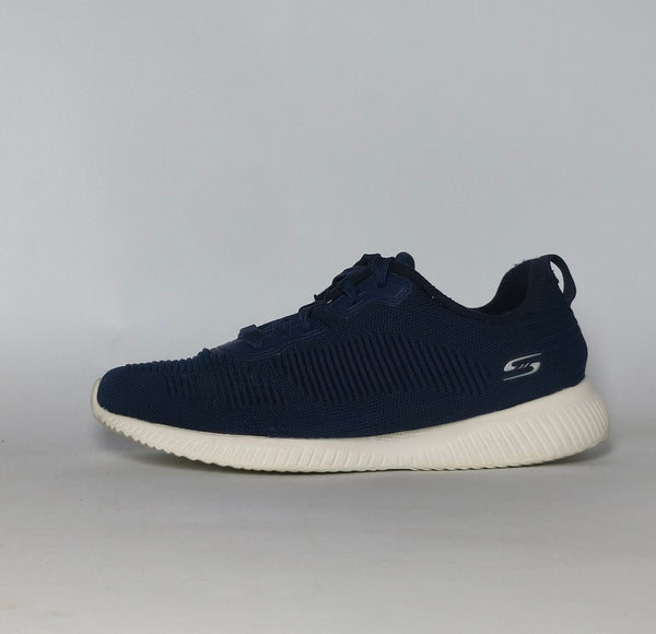 navy blue Skechers BOBS Squad sneaker featuring a white midsole and a textured knit upper.