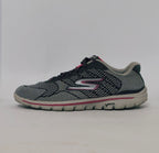 Grey and pink athletic sneakers with breathable knit upper and cushioned sole in used condition size US 8