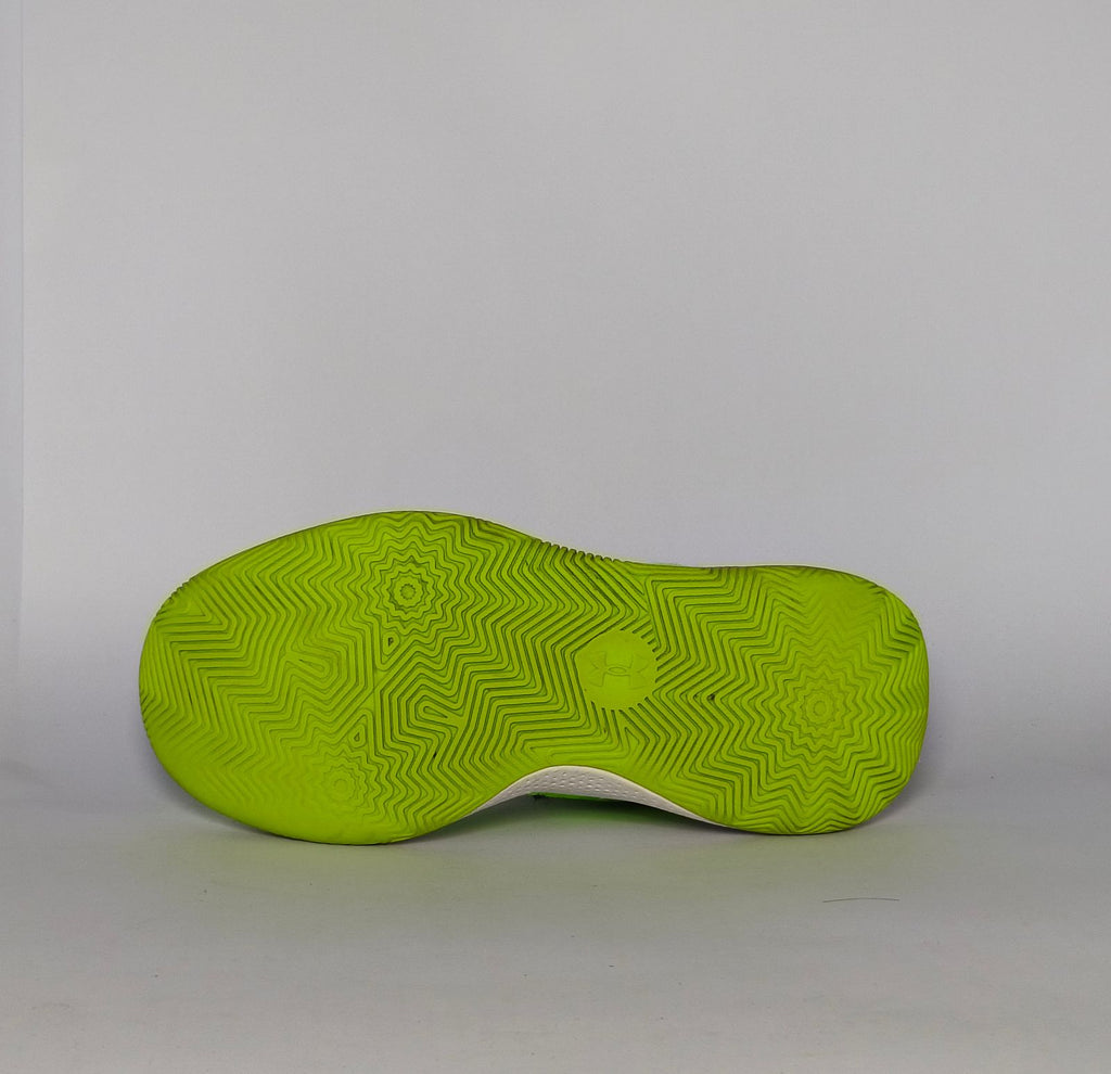 neon green Under Armour Curry Flow 10 basketball shoe featuring a black Warp upper and a white and green Flow midsole.