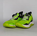 neon green Under Armour Curry Flow 10 basketball shoe featuring a black Warp upper and a white and green Flow midsole.