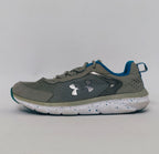 Under Armour training shoe with blue accents and a blue-speckled white midsole.