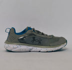 Under Armour training shoe with blue accents and a blue-speckled white midsole.