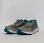 Under Armour training shoe with blue accents and a blue-speckled white midsole.