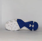 white and royal blue Under Armour cleat featuring a textured forefoot and a durable molded cleat outsole.
