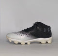 black and silver gradient Under Armour football cleat featuring a textured upper and a white molded cleat outsole.