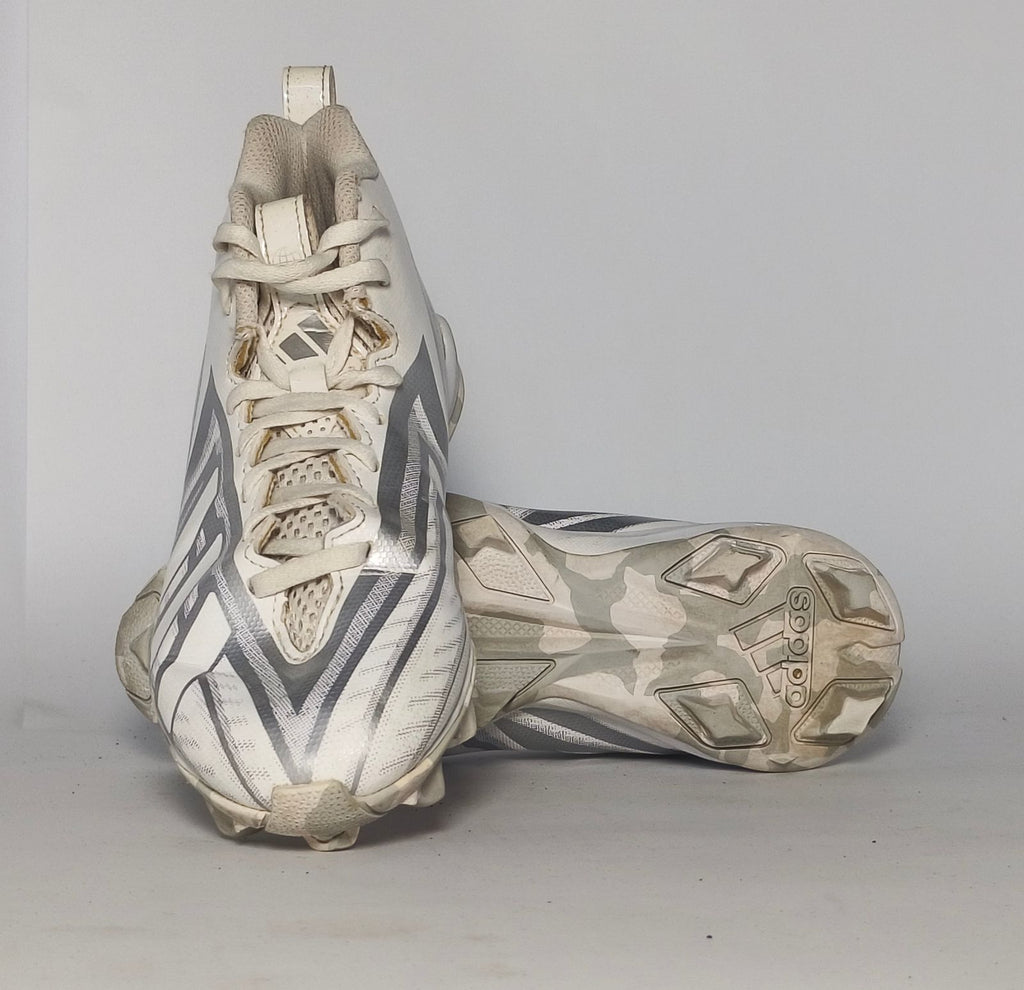 white and silver adidas Adizero football cleat featuring a geometric pattern and a cleated outsole for field traction.
