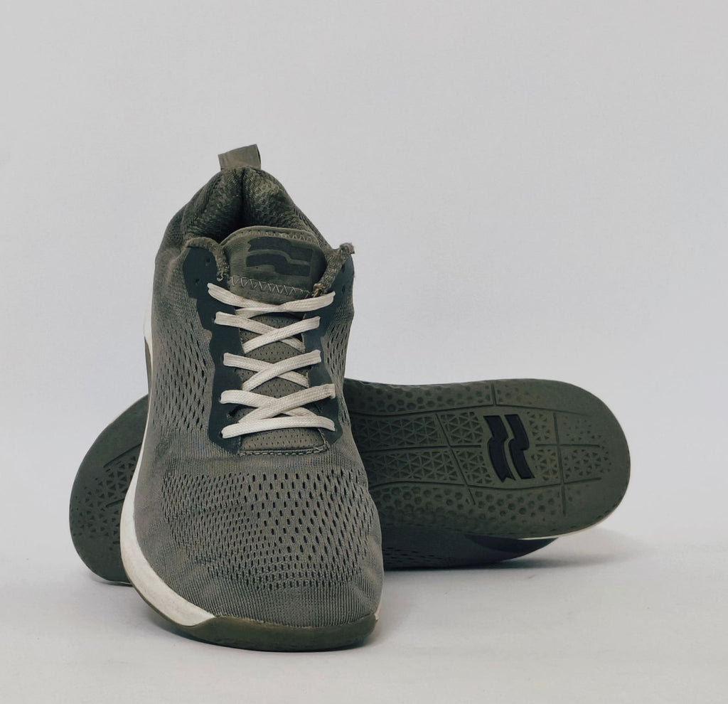 Black athletic sneakers with breathable knit upper and lightweight cushioned sole in used condition size US 7.5
